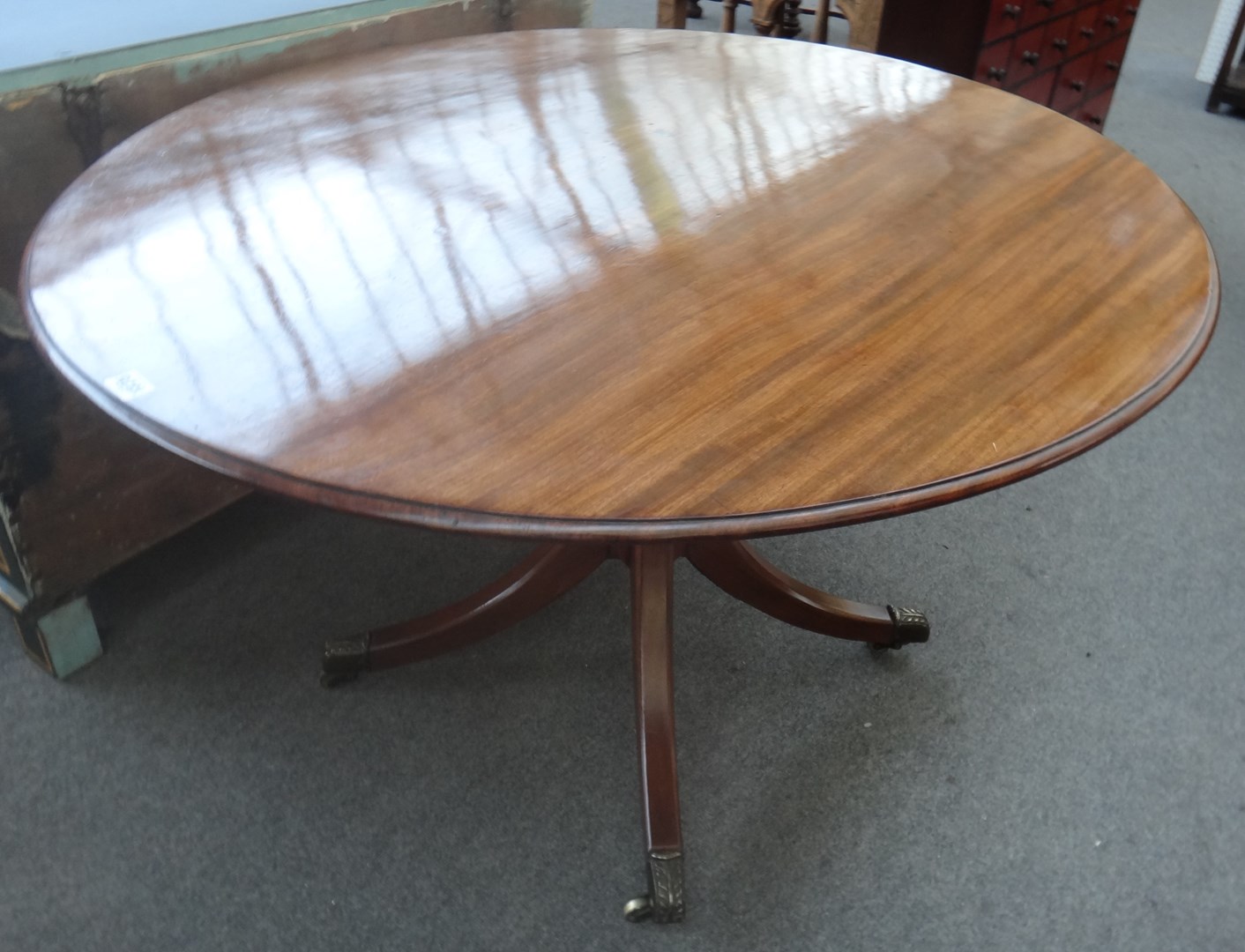 Appraisal: A Regency mahogany oval snap top centre table on four