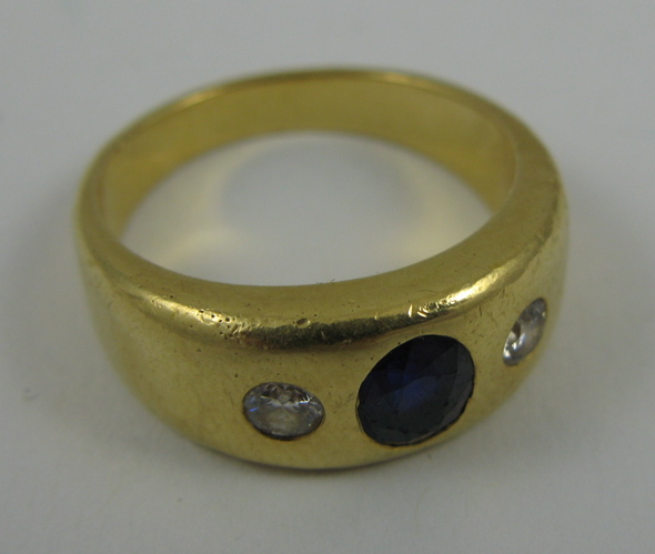 Appraisal: SAPPHIRE DIAMOND AND K GOLD RING set with an oval-cut