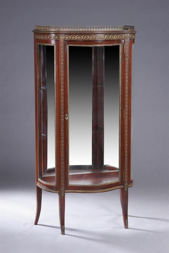 Appraisal: LOUIS XVI STYLE FRUITWOOD CABINET early th century Galleried serpentine