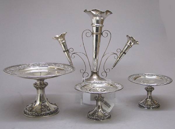 Appraisal: A sterling set of three dessert stands with an epergneWhiting