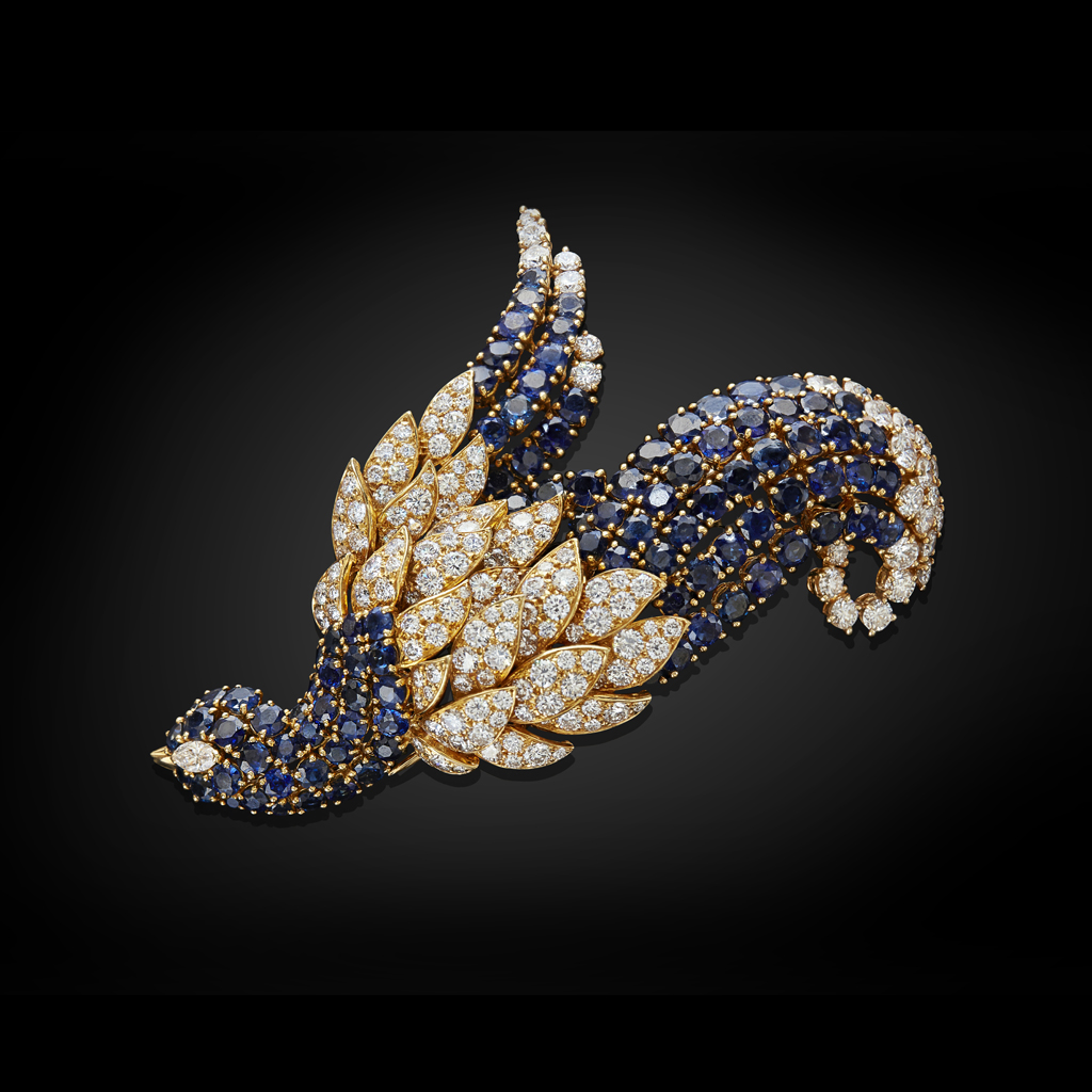 Appraisal: JAHAN GENEVA - A diamond and sapphire set broochmodelled as