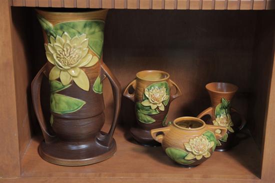 Appraisal: FOUR ROSEVILLE POTTERY VASES All in Water Lily pattern ''