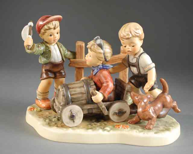 Appraisal: GERMAN HUMMEL PORCELAIN FIGURAL GROUP ''Soap Box Derby '' HUM