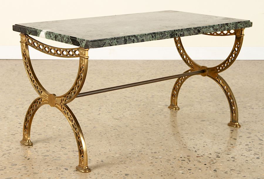 Appraisal: HOLLYWOOD REGENCY STYLE BRASS MARBLE COFFEE TABLE A Hollywood Regency