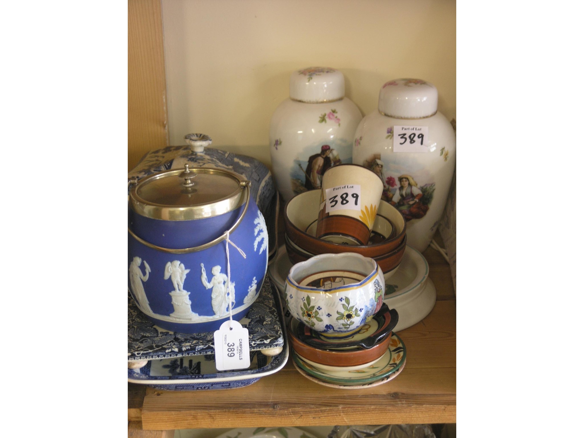 Appraisal: A pair of Rosenthal jars with covers colour-printed various Quimper