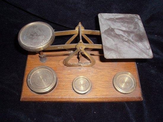 Appraisal: A set of scales with oz oz and oz weights