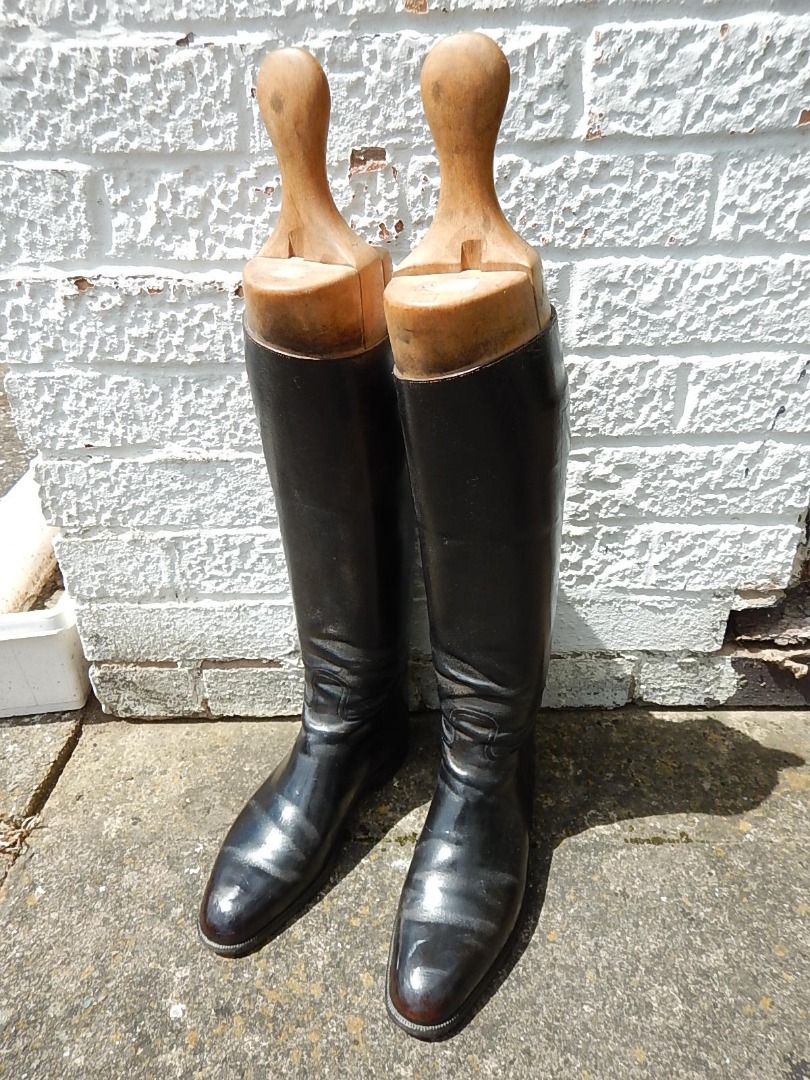 Appraisal: A pair of ladies leather riding boots which beech wood