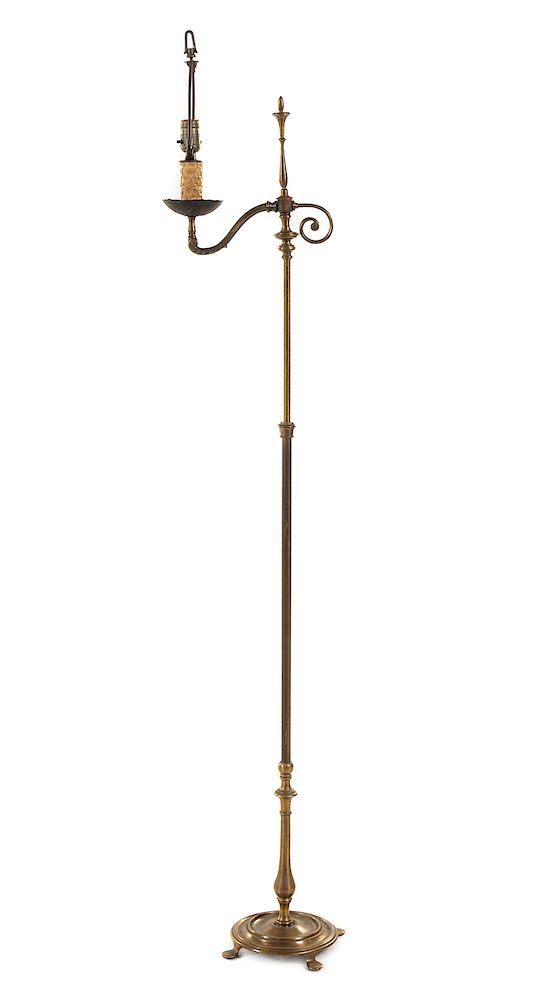 Appraisal: A Primitive Style Brass Candelabrum TH CENT A Primitive Style