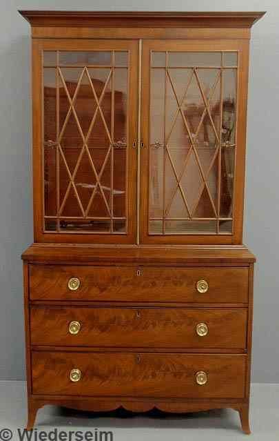 Appraisal: Hepplewhite mahogany bookcase c with crosshatch mullioned doors above three