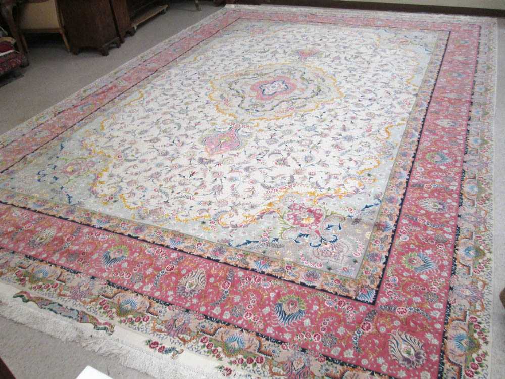 Appraisal: A CONTEMPORARY PERSIAN WOOL AND SILK CARPET colorful floral and