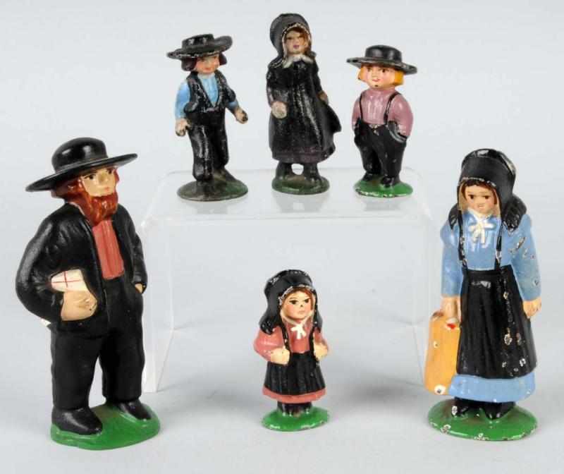 Appraisal: Lot of Cast Iron Amish Family Description Made by Hubley