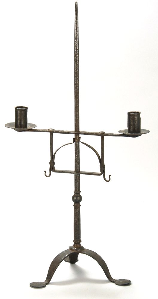 Appraisal: UNUSUAL ADJUSTABLE WROUGHT IRON DOUBLE CANDLESTICK With penny feet Height