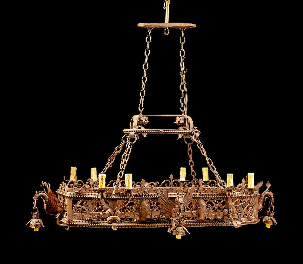 Appraisal: An American Wrought Iron and Tole Twelve-Light Chandelier An American