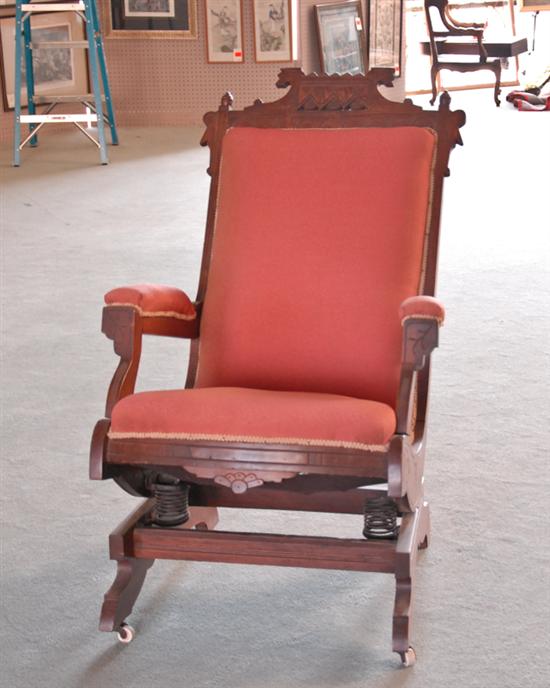 Appraisal: A Renaissance Revival th C Platform Rocker of incise carved