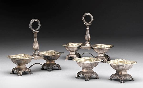 Appraisal: A French standard silver partial condiment suite th century Comprising