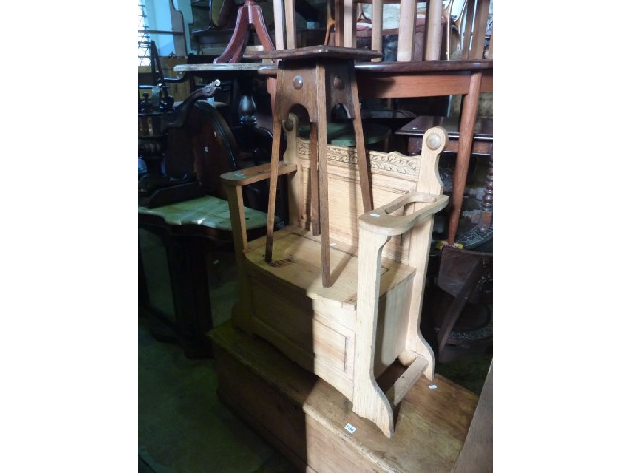 Appraisal: A stripped oak hall stickstand with box base and a