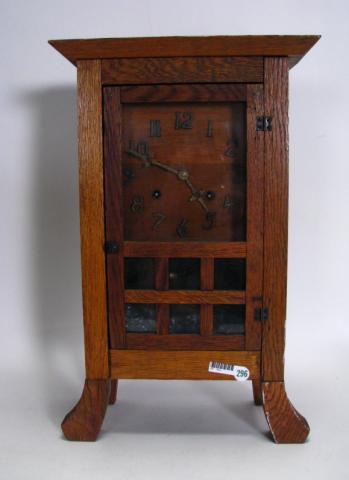 Appraisal: Early th century mission-style clock in oak case with wood