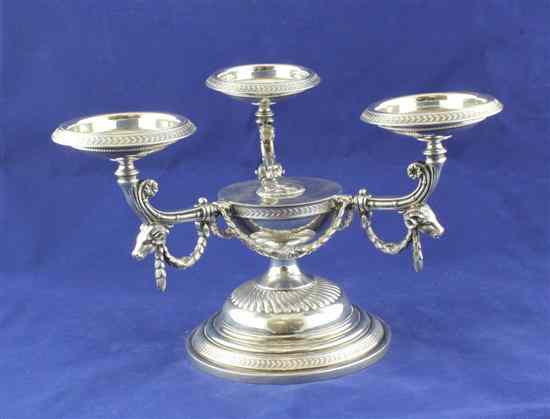 Appraisal: A late Victorian silver centrepiece with three scroll arms decorated