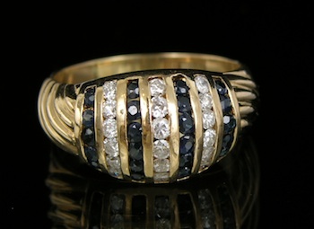 Appraisal: A Diamond and Sapphire Cocktail Ring k yellow gold cocktail