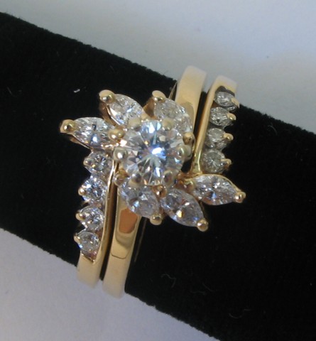 Appraisal: DIAMOND WEDDING SET k yellow gold and set with a