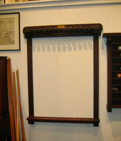 Appraisal: BRUNSWICK-BALKE-COLLENDER CO Arts Crafts -stick rack with geometric inlaid highlights