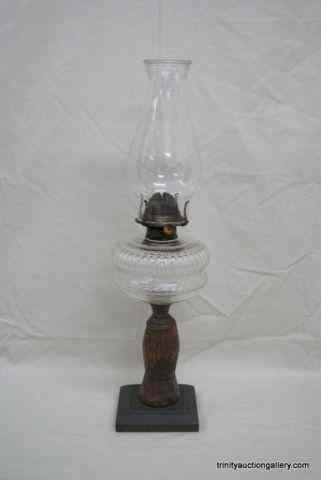 Appraisal: Antique Banner Lantern Co Wood Based Oil LampThis for a