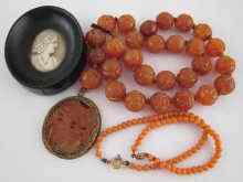 Appraisal: A mixed lot comprising an antique carved hardstone bead necklace