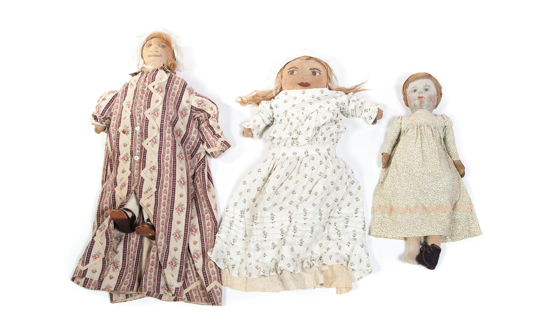 Appraisal: THREE LARGE CLOTH DOLLS American late th-early th century One