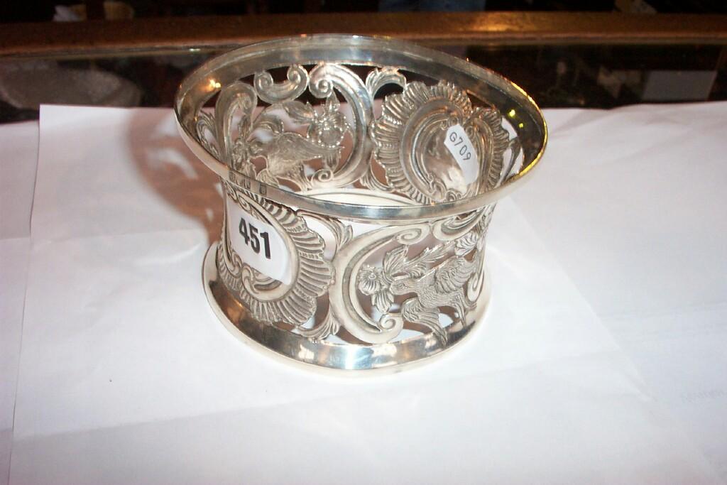 Appraisal: A silver comport stand of pierced and embossed form featuring