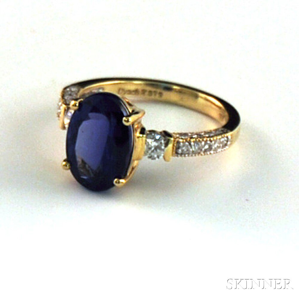 Appraisal: kt Gold Tanzanite and Diamond Ring centering an oval-cut blue