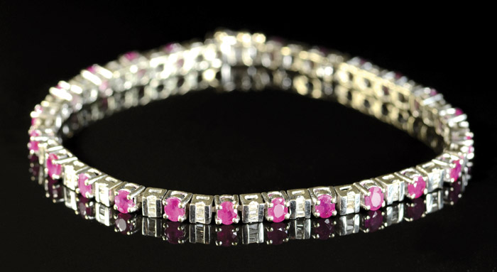 Appraisal: DIAMOND RUBY AND EIGHTEEN KARAT GOLD BRACELET The white gold