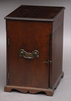 Appraisal: GEORGE III MAHOGANY MEDICINE CABINET The hinged top opening to