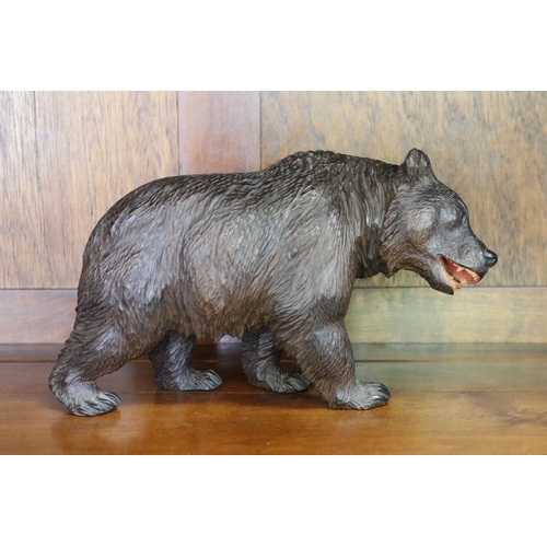 Appraisal: Black Forest carved wood bear approx cm H x cm