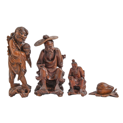 Appraisal: Three Japanese carved rootwood figures of immortals and a contemporary