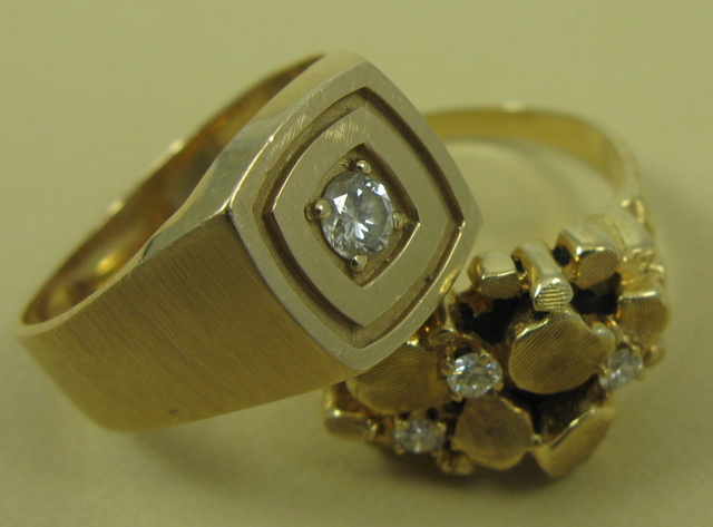 Appraisal: TWO DIAMOND AND FOURTEEN KARAT GOLD RINGS one centers a