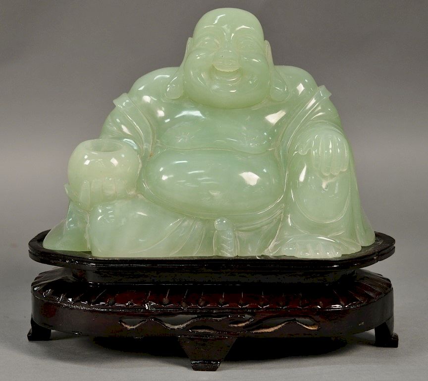 Appraisal: Large carved jade or jadeite figure of a seated buddha