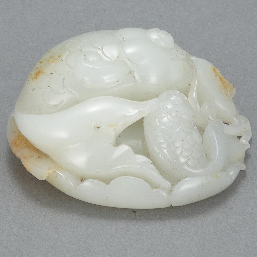 Appraisal: Chinese White Jade Carp Group Qing Dynasty The two carp