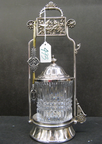 Appraisal: A MERIDEN COMPANY SILVER PLATED PICKLE CASTOR Victorian Period the