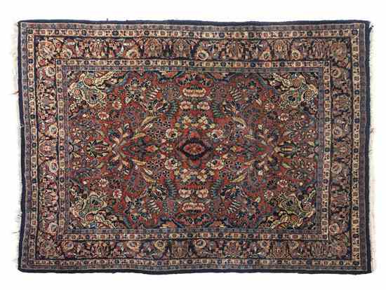 Appraisal: A Kazvin Wool Rug having a foliate center medallion on