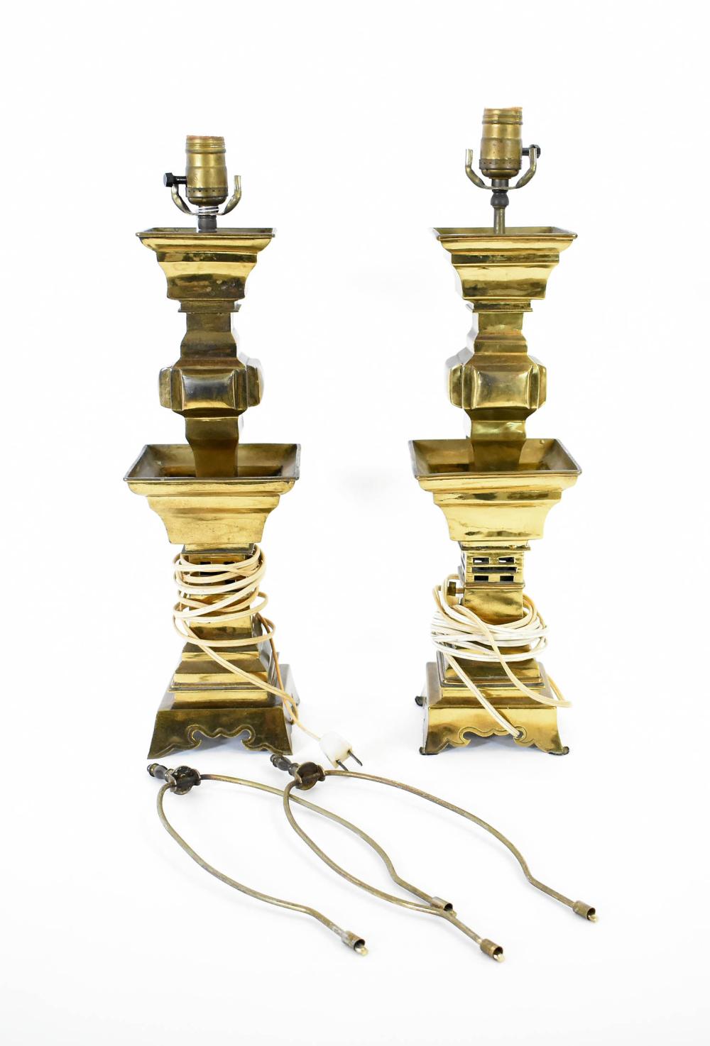 Appraisal: PAIR OF BRASS CANDLESTICK-FORM LAMPSSquare in form and cast in