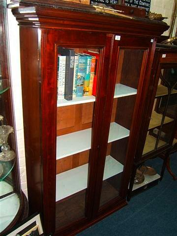 Appraisal: A Victorian mahogany book case top with two glazed doors