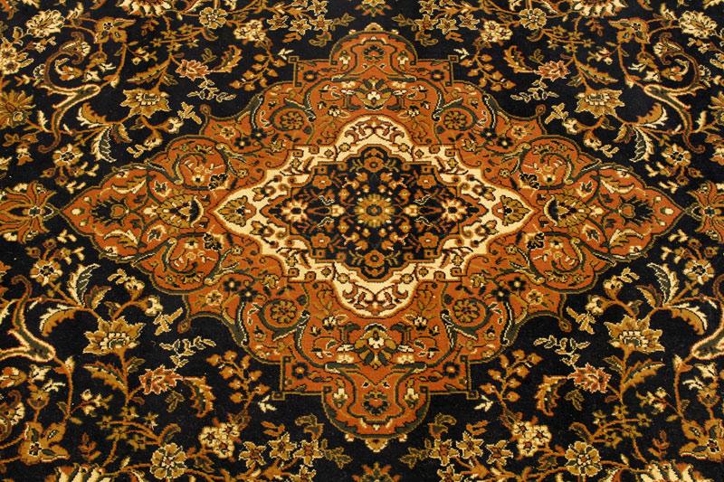 Appraisal: - Machine Woven Rug Machine woven rug with a Persian