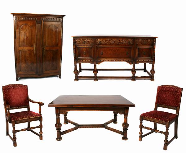 Appraisal: A Renaissance Revival dining suite comprising a table five side