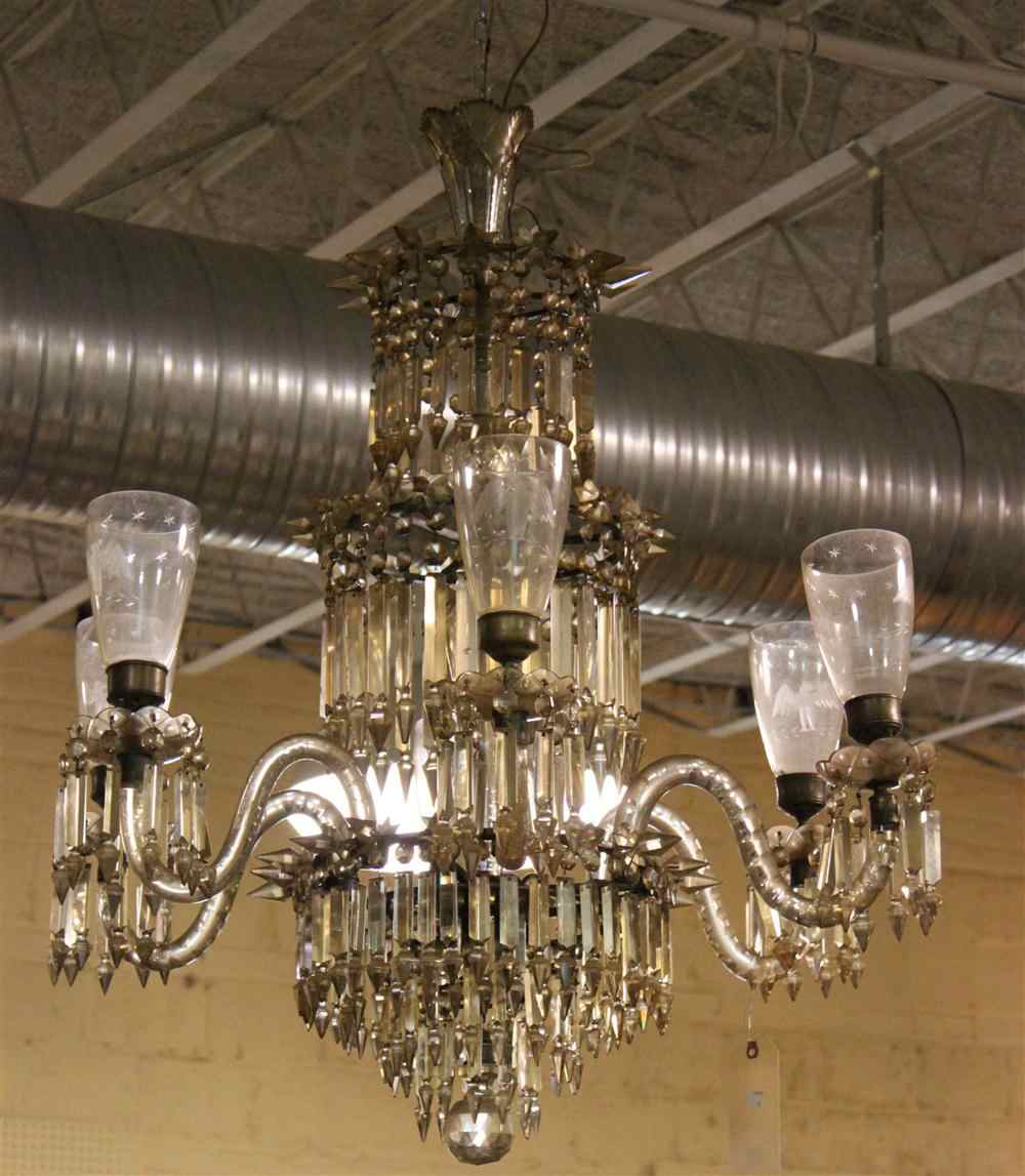 Appraisal: ANTIQUE SIX-LIGHT CRYSTAL CHANDELIER each light with eagle etched hurricane