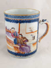 Appraisal: A large Chinese ceramic mug with dragon handle finely painted