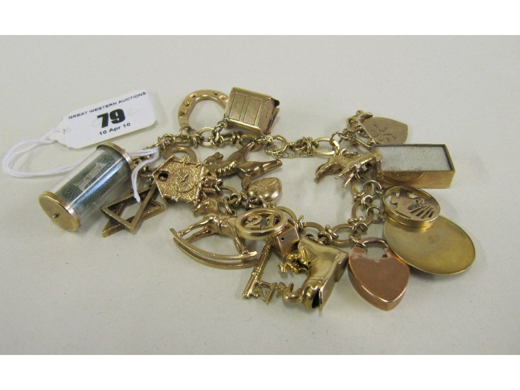 Appraisal: Nine carat gold charm bracelet with various gold charms Approx