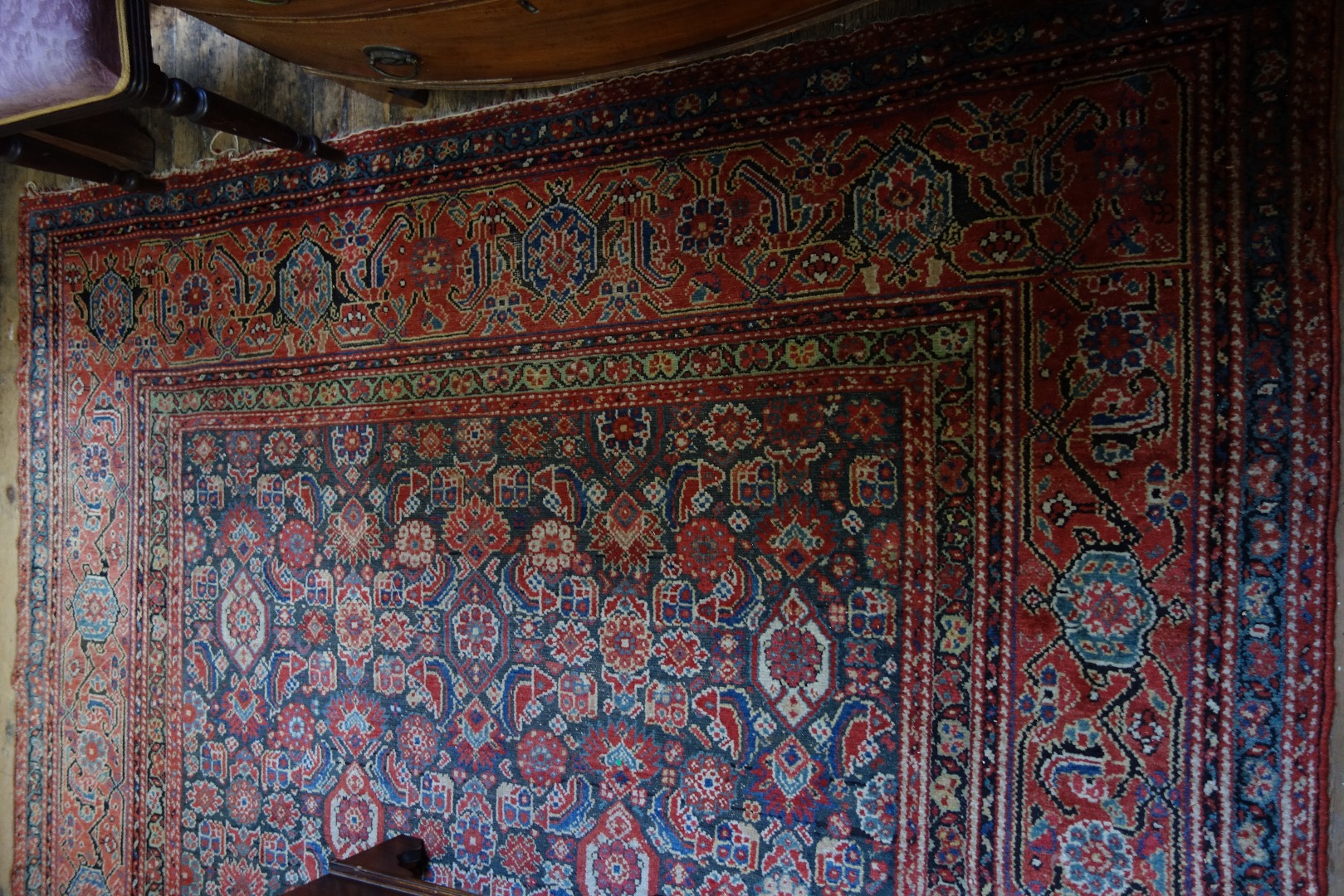 Appraisal: A Hamadan carpet with an allover design of flowers and