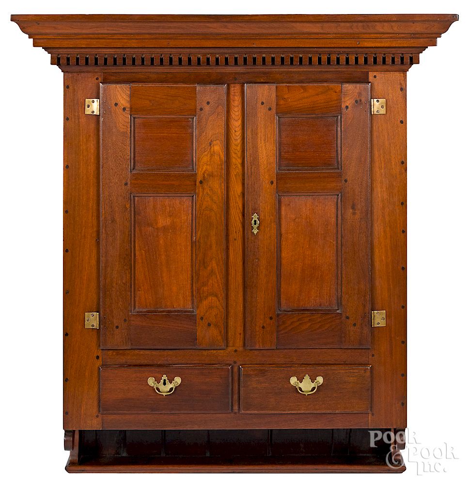 Appraisal: Large Pennsylvania walnut hanging cupboard Large Pennsylvania walnut hanging cupboard