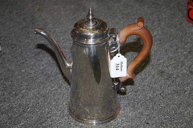 Appraisal: A GEORGIAN STYLE SILVER COFFEE POT of tapering cylindrical form