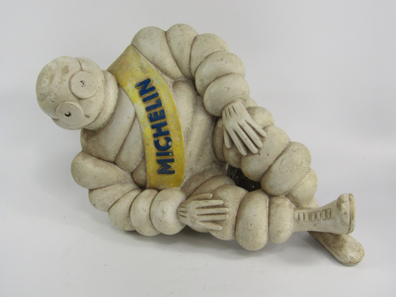 Appraisal: A large composite figure of a Michelin Man with brass